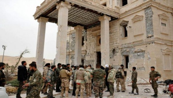 160325163535_syria_palmyra_govt_troops_624x415_ap